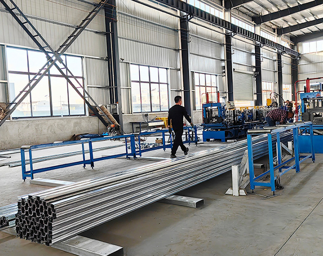 Crane lifting steel beams